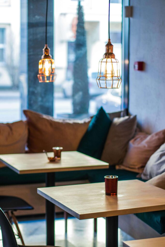 Two round pendant lamps in a cafe